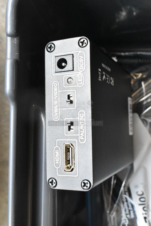 HDMI video converter in poly bin, featuring HDMI, CVBS/S-Video ports, and PAL/NTSC switch, in good condition.