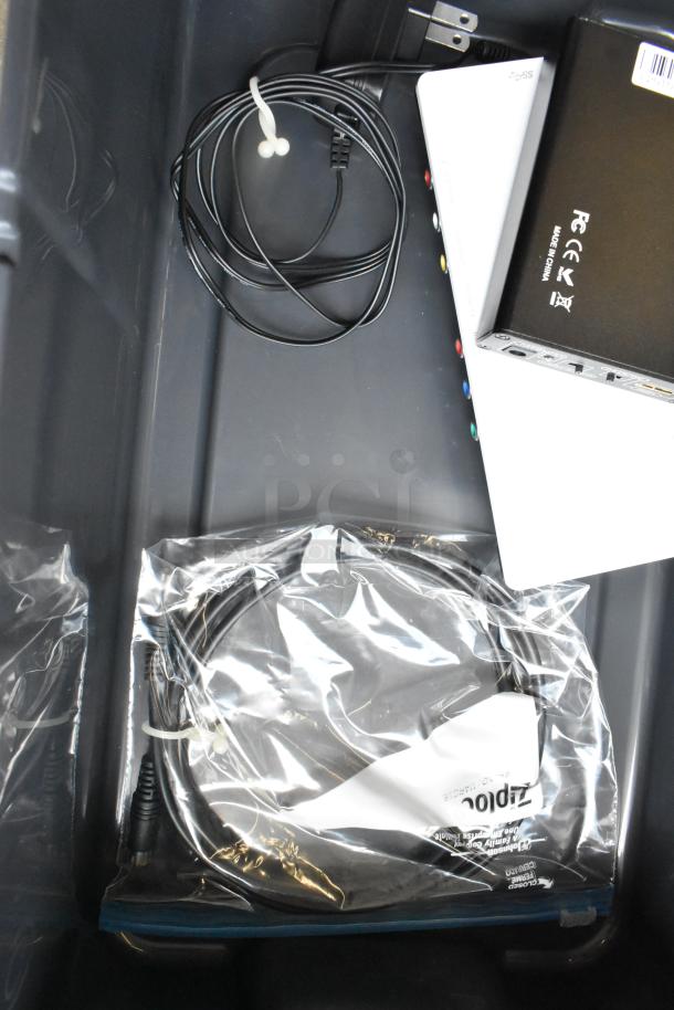 HDMI video converter set in poly bin with cables and packaging, showing ports and connectors, condition appears unused.