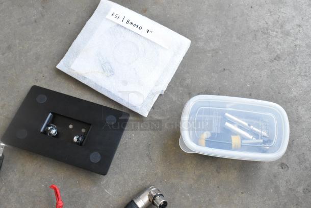 Flanders Scientific Zunzheng BM090 monitor accessories, including cables and tools, in a labeled hard case, good condition.