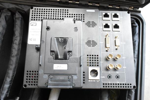 Flanders Scientific Zunzheng BM090 broadcast monitor in hard case, rear panel showing connectors, wires included. Year 2016.