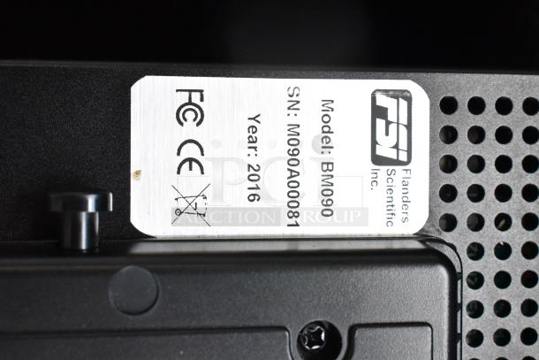 Flanders Scientific Zunzheng BM090 Broadcast Monitor, model BM090, serial M090A00081, year 2016, shown with FCC and CE markings.