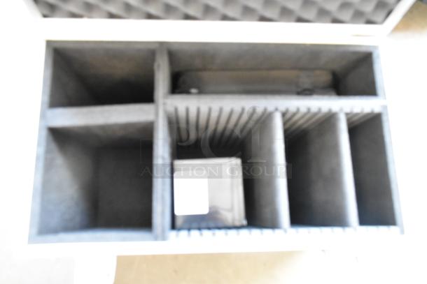 Vipow LP14-12 battery in a protective hard case with foam compartments, indicating secure storage.