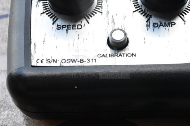 Ditogear TRI-B-210 Motion Control Slider with controls for speed and damp. Serial number OSW-B-311. Good condition.