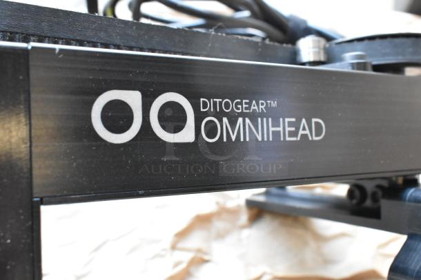 Ditogear Omnihead unit with Nucleus Wireless Lens Control System, black finish, logo visible, in good condition.