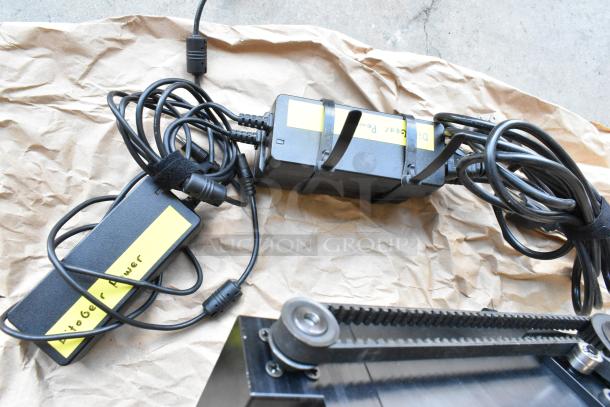 Ditogear Omnihead Unit with cables and Nucleus Wireless Lens Control System. Tag reads "Ditogear Power". Good condition.