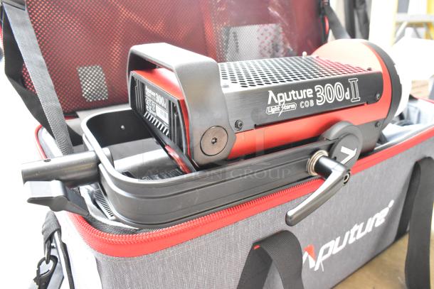 Aputure 300 II Daylight Monolight with Light Storm COB 300 II in a protective case, highlighting its robust design and functionality.
