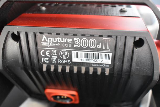 Aputure Light Storm COB 300d II label close-up, showcasing model details and certifications.