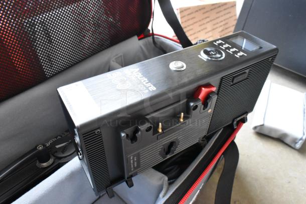 Aputure 300 II Daylight Monolight with Light Storm COB 300 II, in a protective case. Appears in good condition, includes control unit.