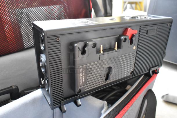 Aputure 300 II Daylight Monolight with Light Storm COB 300 II, shown in a carrying case, features control panel and mount.