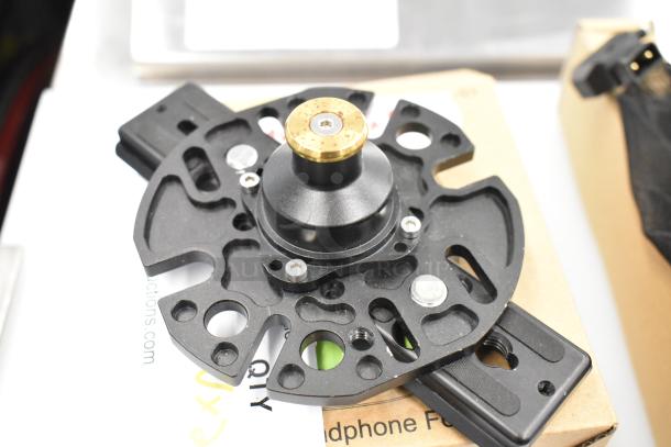 Movi Ninja Star with cable, black metal frame, circular design, used condition, includes adjustment screws on packaging.