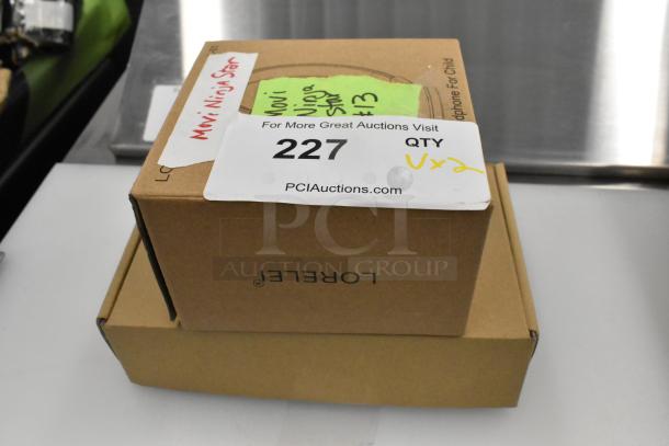 Two brown boxes labeled "Movi Ninja Star" with auction tag 227 indicating double quantity.