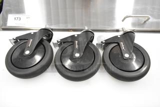 Box of 3 black commercial casters with swivel mount. Durable rubber wheels, visible brand marking "Katalina." Excellent condition.