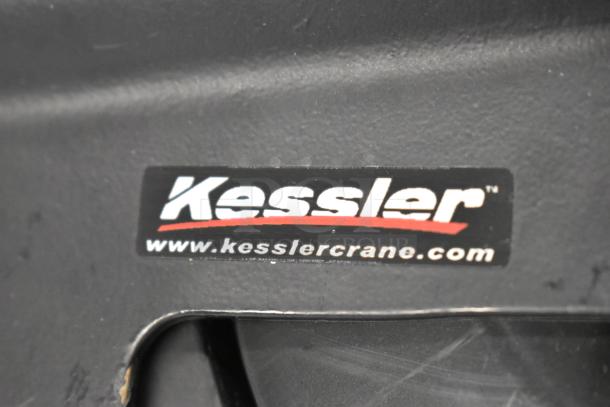 Box of three commercial casters with Kessler brand label; durable for heavy-duty use, excellent condition.