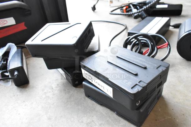 IDX VL-2X 2ch Sequential Quick Charger with rechargeable battery, shown with power cords, in good condition.