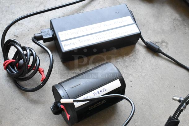 IDX VL-2X Two-Channel Sequential Quick Charger with rechargeable battery in case; includes power adapter and labelled cables.