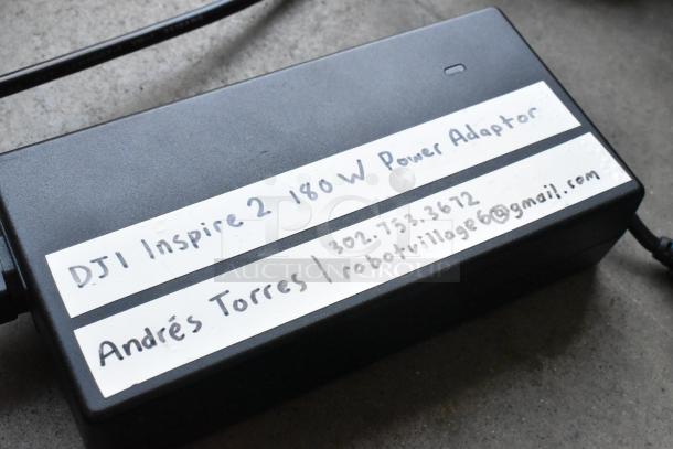 IDX VL-2X quick charger with rechargeable battery, in protective case. Labels indicate usage for DJI Inspire 2.