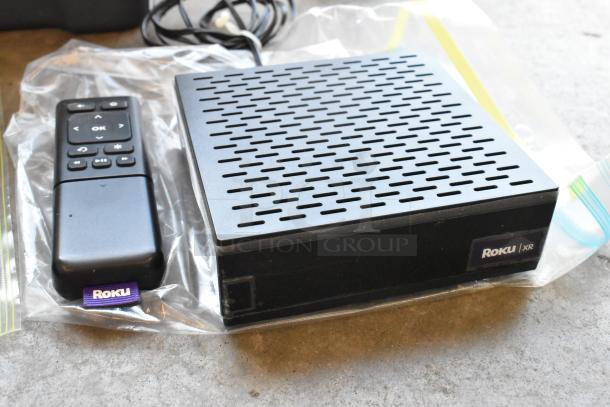 Seagate FreeAgent Theater Roku digital video player with remote, good condition, includes Roku XR label.