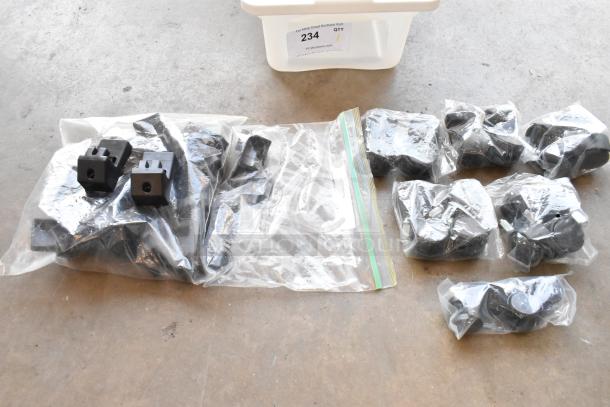 Lot of clips and casters in poly bin; multiple sealed bags; variety in good condition; bin labeled "234".
