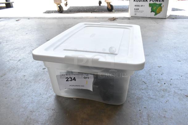 Poly bin containing a lot of clips and casters, labeled "234" from PCI Auctions.