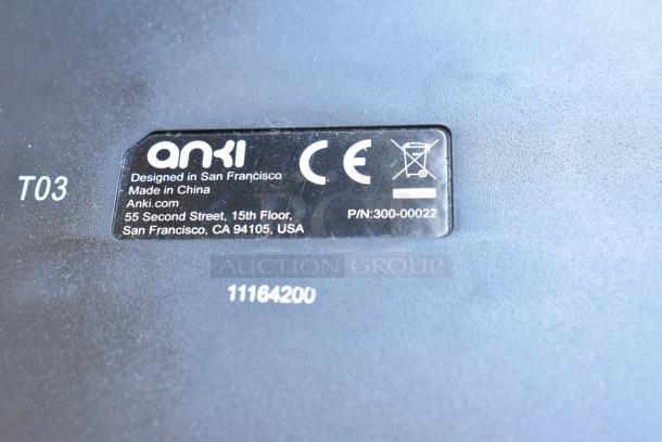 Label with "Anki, Designed in San Francisco, Made in China," CE mark, and P/N: 300-00022 on a device casing.