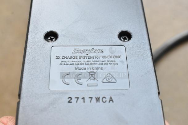 Energizer 2X Charge System for Xbox One with visible model numbers and "Made in China" label.