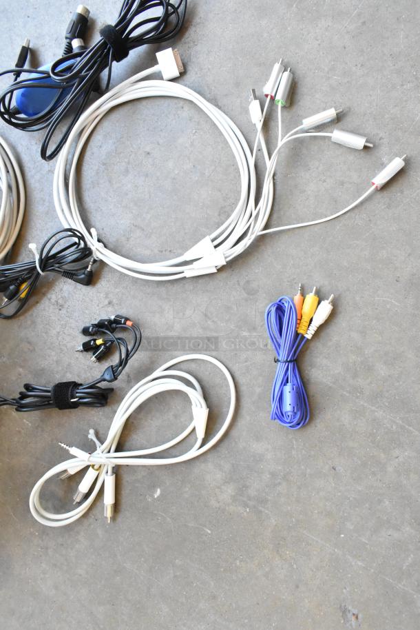 Mixed lot of assorted wiring cables in poly bin. Includes various lengths and connector types. Good condition.