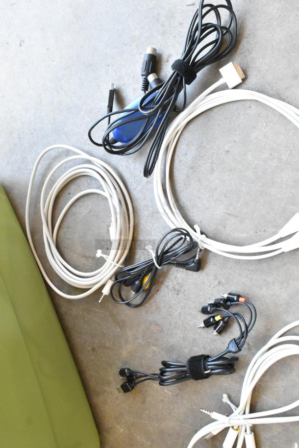 Lot of assorted wiring in a poly bin, various cables including audio and video connectors, good condition.