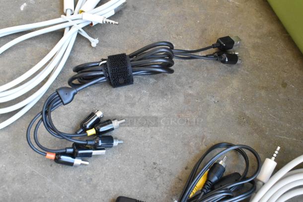Lot of assorted wiring in a poly bin, includes RCA connectors, 3.5mm jacks, USB cables; various conditions.