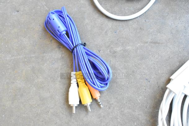 Lot of wiring in poly bin including bundled blue cable with RCA and auxiliary connectors, in good condition.
