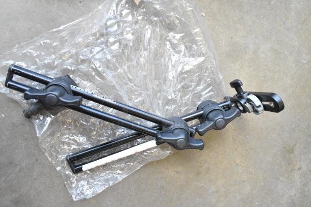 Lot of various photography equipment including Manfrotto 396B-2 arm on bubble wrap, in good condition.