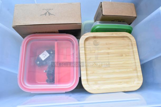Lot of various items in a poly bin, including Movi Pro Pop-n Lock and wooden tray. Boxes labeled "Freefly" visible.