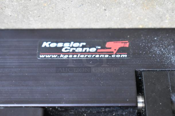 Kessler Crane Jib heads with logo and website on black metal surface. Excellent condition, suitable for filmmaking.
