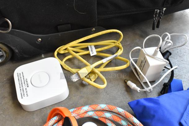 Think Tank soft bag with yellow Ethernet cable, Philips hub, and power adapter, in good condition.
