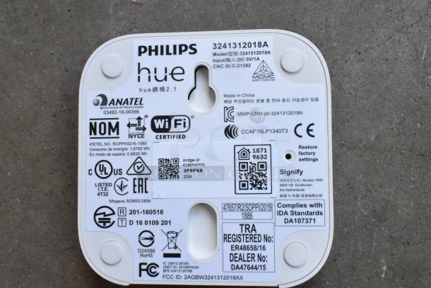 Philips Hue label with model number 3241312018A, WiFi certification, and regulatory compliance details.