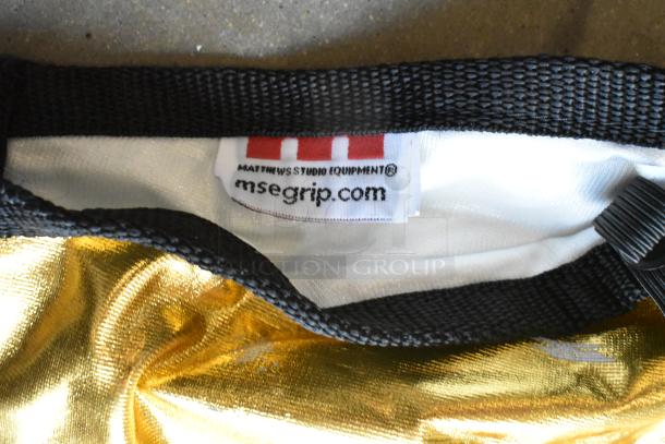 Hard poly bin contents include Matthews Studio Equipment fabric with gold texture, label showing "msegrip.com."