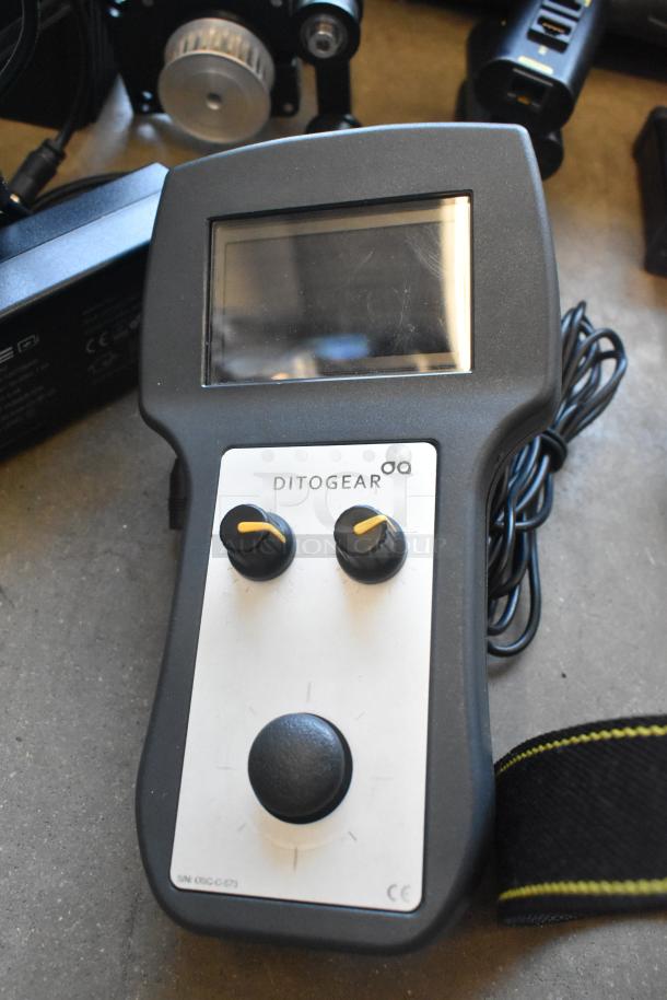 Lot with Ditogear unit, 3 modules, 2 LensDrives, and Sony controller. Includes cables, all in a hard case, good condition.
