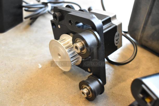 Ditogear module with metal pulley and rollers, part of a lot including Ditogear unit, modules, LensDrives, and Sony controller.
