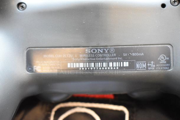 Sony Wireless Controller model CUH-ZCT2U, 5V 800mA, label with serial number, in good condition.