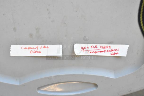 Lot of 3-pin XLR and component video cables in poly bin. Labels indicate cable types. Good condition.