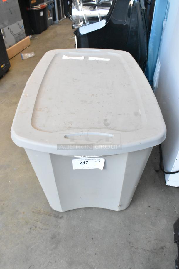Gray poly bin containing a lot of 3-pin XLR cables and component video cables. Auction label marked "247."