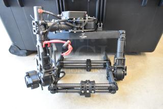 Freefly Mavi M10 Full Cage Gimbal, model M10B22910, features carbon fiber construction. Shows minor wear, includes control unit.