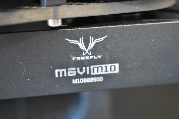 Freefly Mavi M10 full cage gimbal, model M10B22910, black with Freefly logo, in excellent condition.