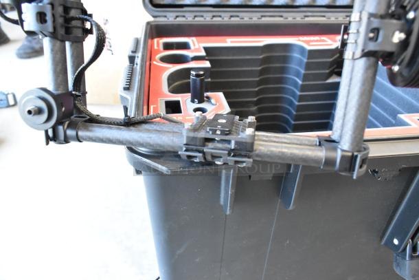Freefly Mavi M10 M10B22910 gimbal with full cage, shown in protective case. Features carbon fiber build, good condition.
