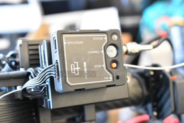 Freefly Mavi M10 M10B22910 Full Cage Gimbal, featuring Spektrum status panel, wires, and ports.