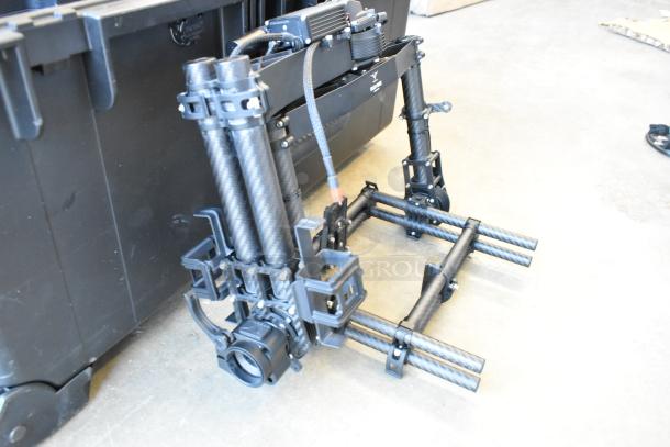 Freefly Mavi M10 gimbal with full cage, model M10B22910. Features carbon fiber rods, in excellent condition.
