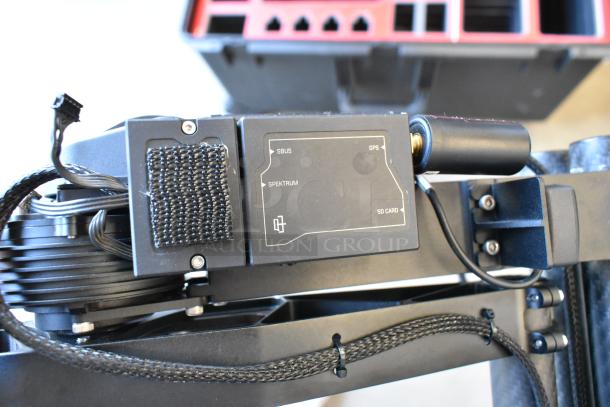 Freefly Mavi M10 Full Cage Gimbal M10B22910, visible ports for SBUS, GPS, Spektrum, SD Card. Appears in good condition.