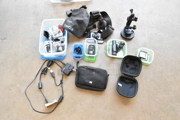 Lot of various items in a poly bin including GoPro accessories, wires, poly containers, and a Chesly GoPro chest mount.