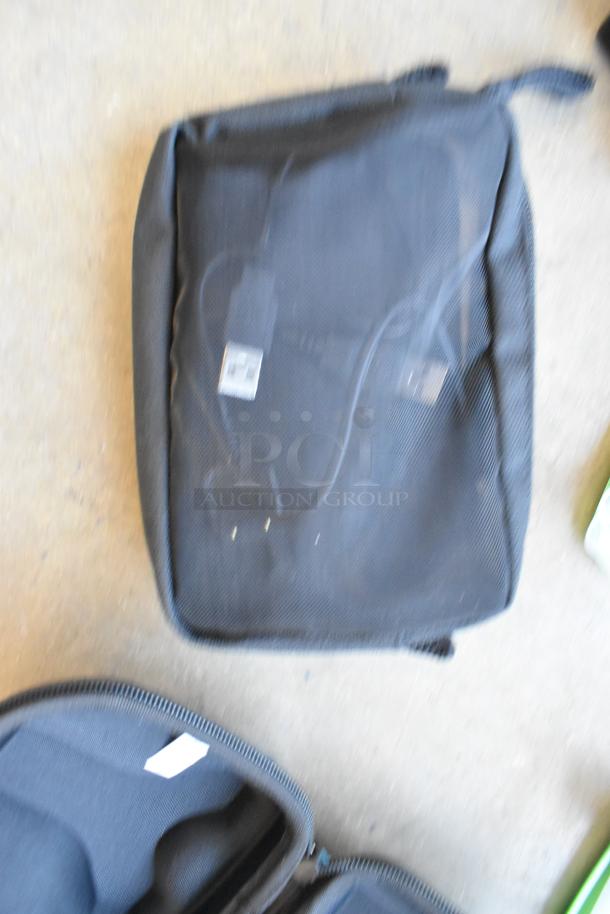 Lot of various items including GoPro accessories, cables, and poly containers in a poly bin. Items appear lightly used.