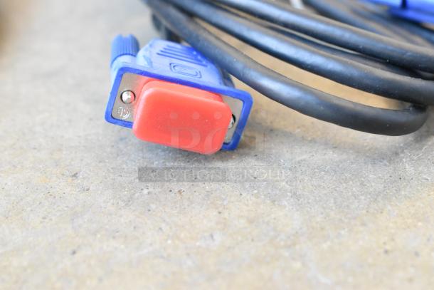 Lot of various wires in a poly bin, featuring a VGA cable with blue and red connectors, in good condition.