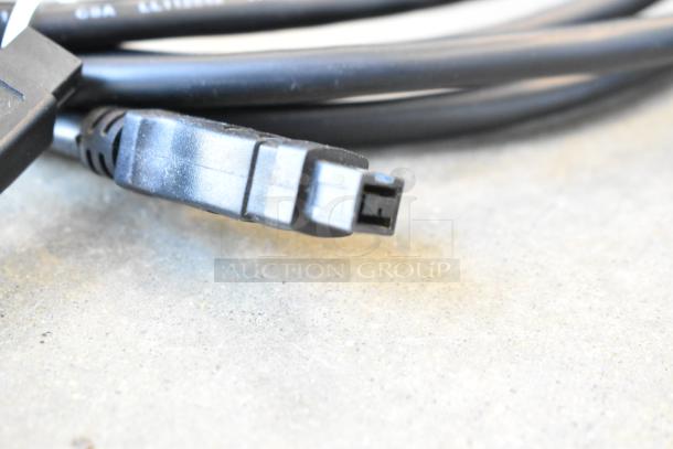 Lot of various wires, black connectors, in poly bin. Good condition with some surface marks, ideal for electronic use.
